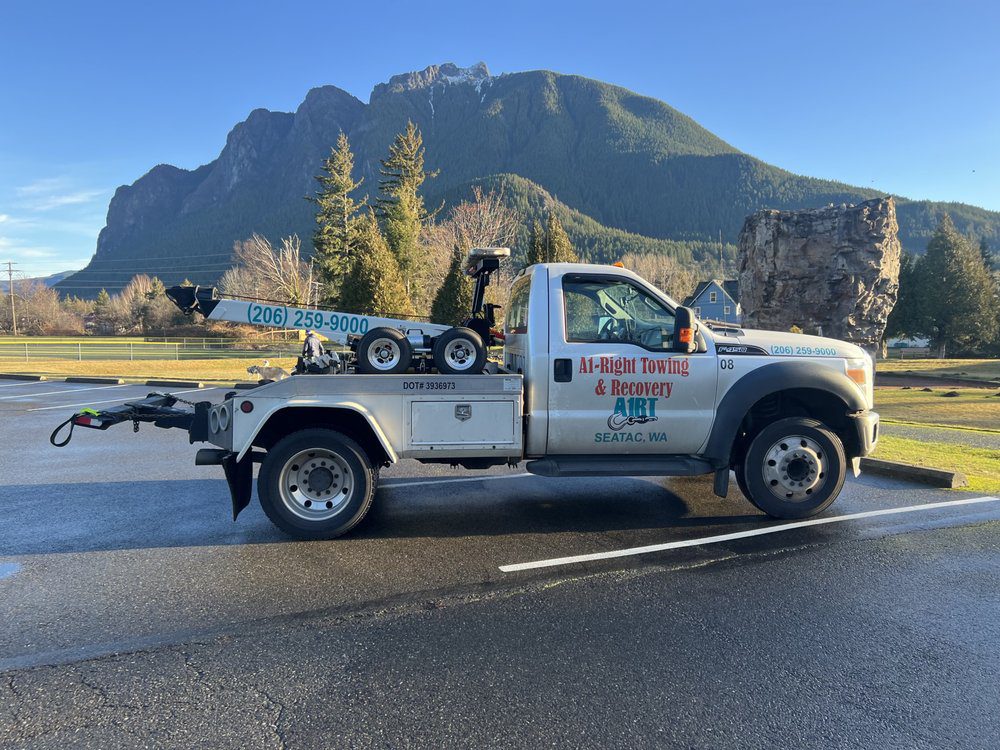 a1rt (1) white truck towing